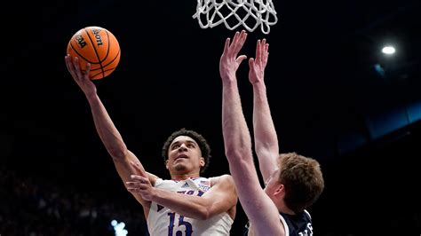 McCullar scores 34 as No. 2 Kansas gets past Yale after trailing at halftime